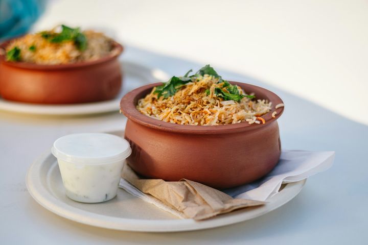 Biryani in clay pots with raita