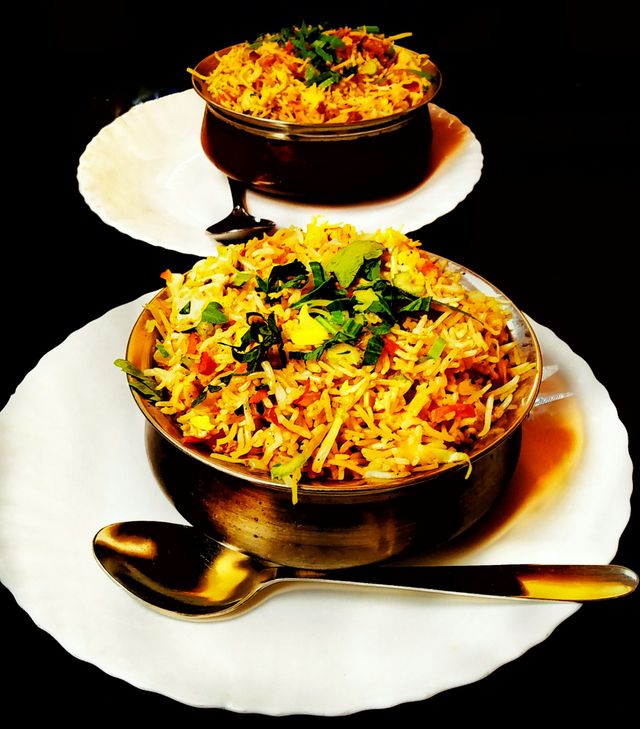 Biryani served in a copper handi